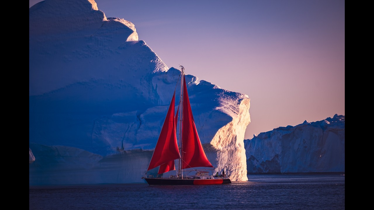 Exploring the Greenland: A Journey Through Ice and Isolation with red sails