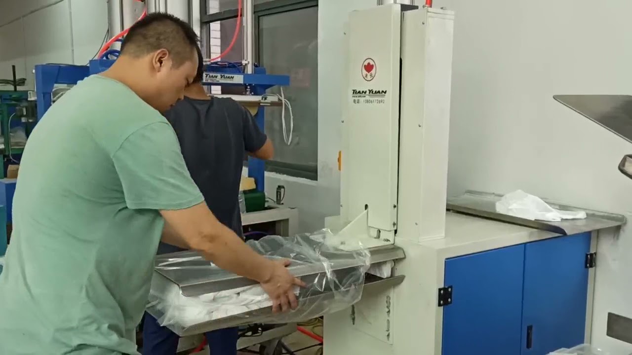 TIAN YUAN bed set packing machine,bed sheet packaging machine,bed sheet vacuum packing machine