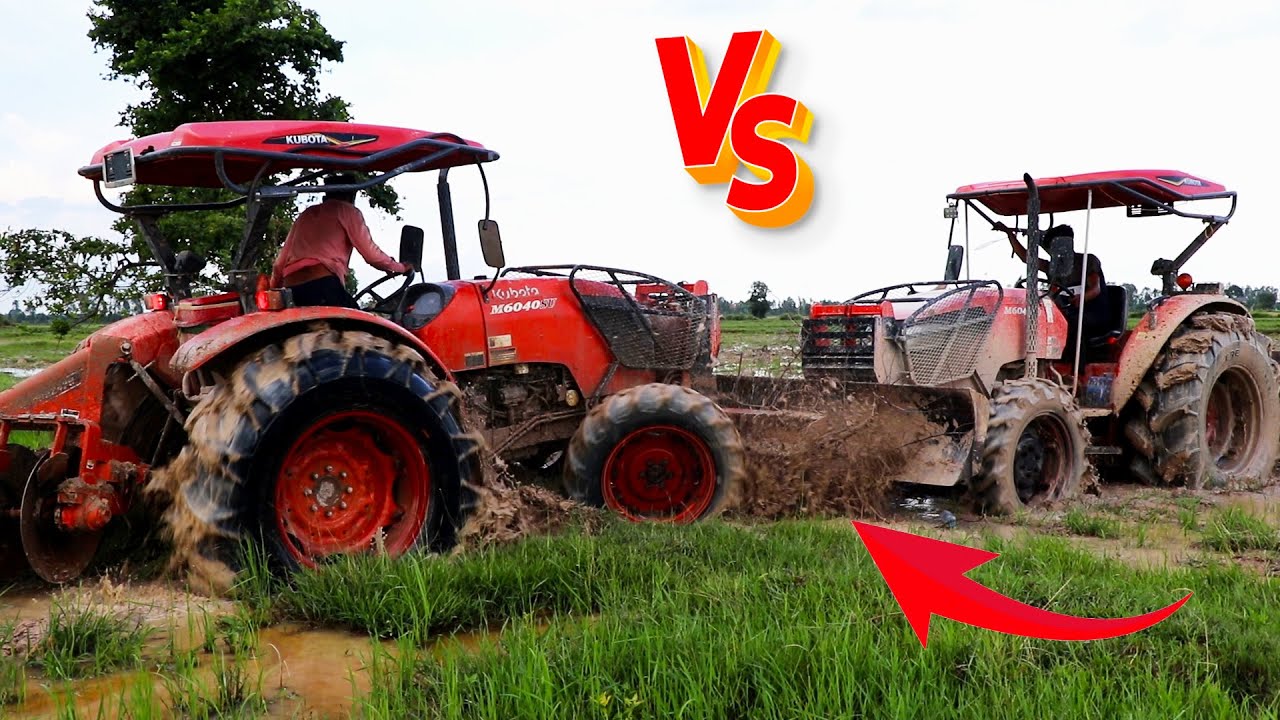 Two Tractor Kubota M6040SU Pushing Together To Get Help For Run Away From Deep Mud Pit Stuck