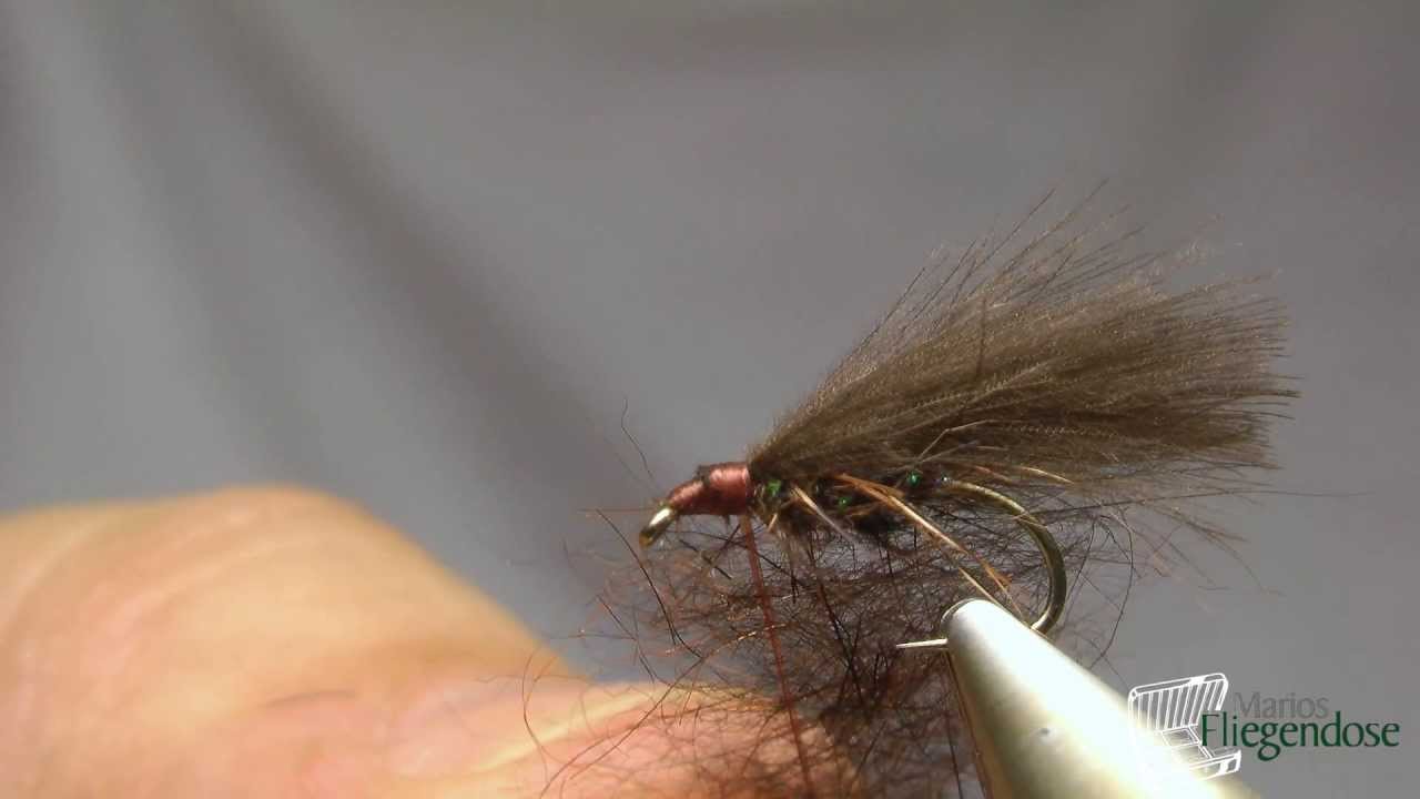 Marios Fliegendose bindet eine braune CDC Köcherfliege