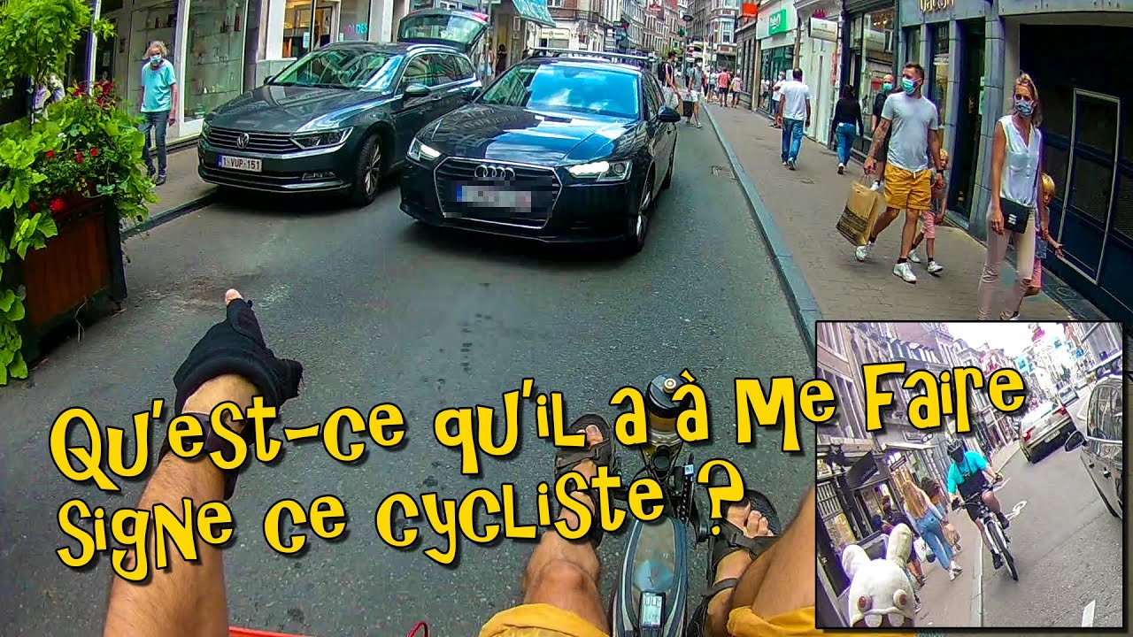 2 cyclistes vs automobilistes sur un circuit de course à Namur ?