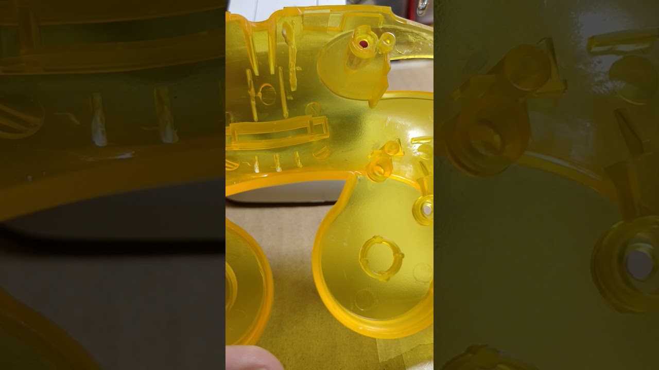 How to modify third party GameCube controller shells to fit OEM motherboards.