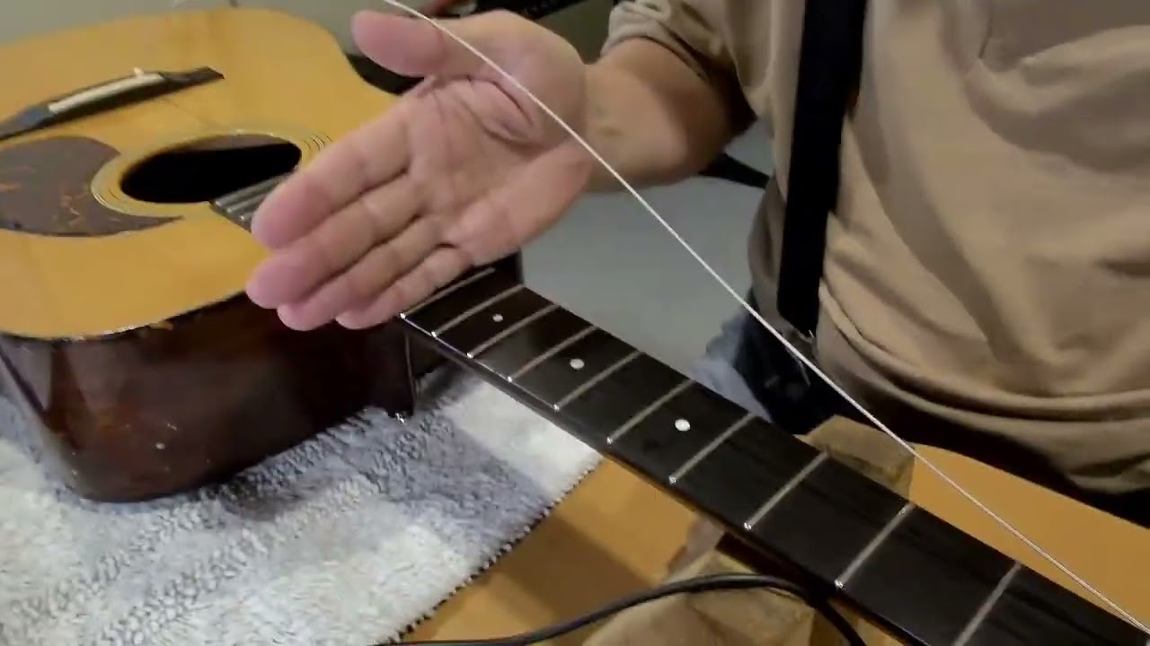Tuning issues: Properly stringing a steel string acoustic guitar.