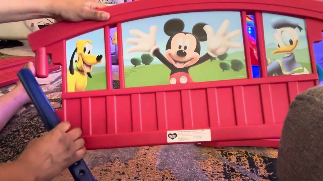 Assembling Delta children’s Disney Mickey Mouse bed and toy box for my grandson 🤗￼