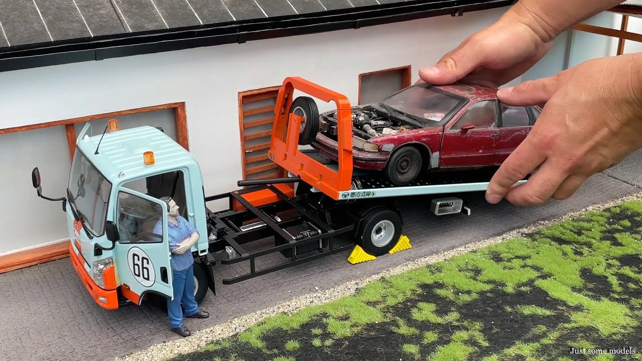 1:18 Naveco Yuejin flatbed tow truck with accessories - DBGT [Unboxing]