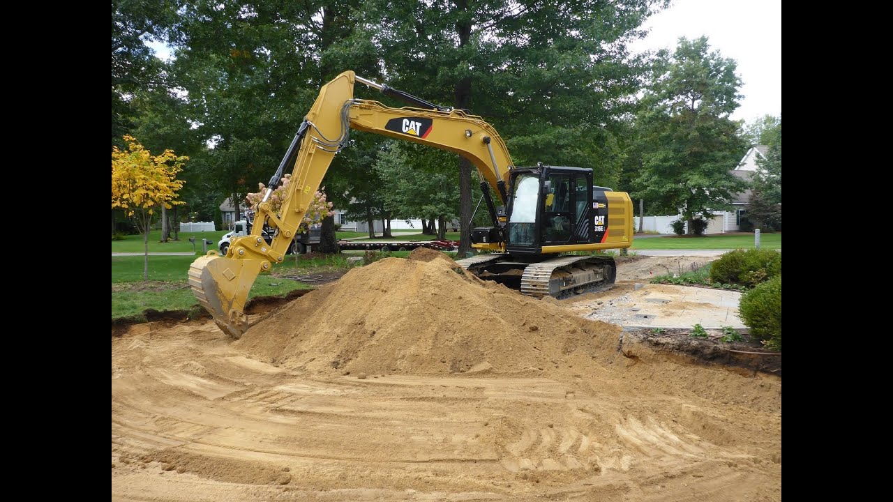 Cat 316E Excavating For Driveway Using Trimble GCSFlex System