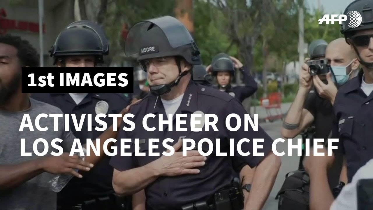 US: Activists cheer on Los Angeles police chief during George Floyd protest | AFP