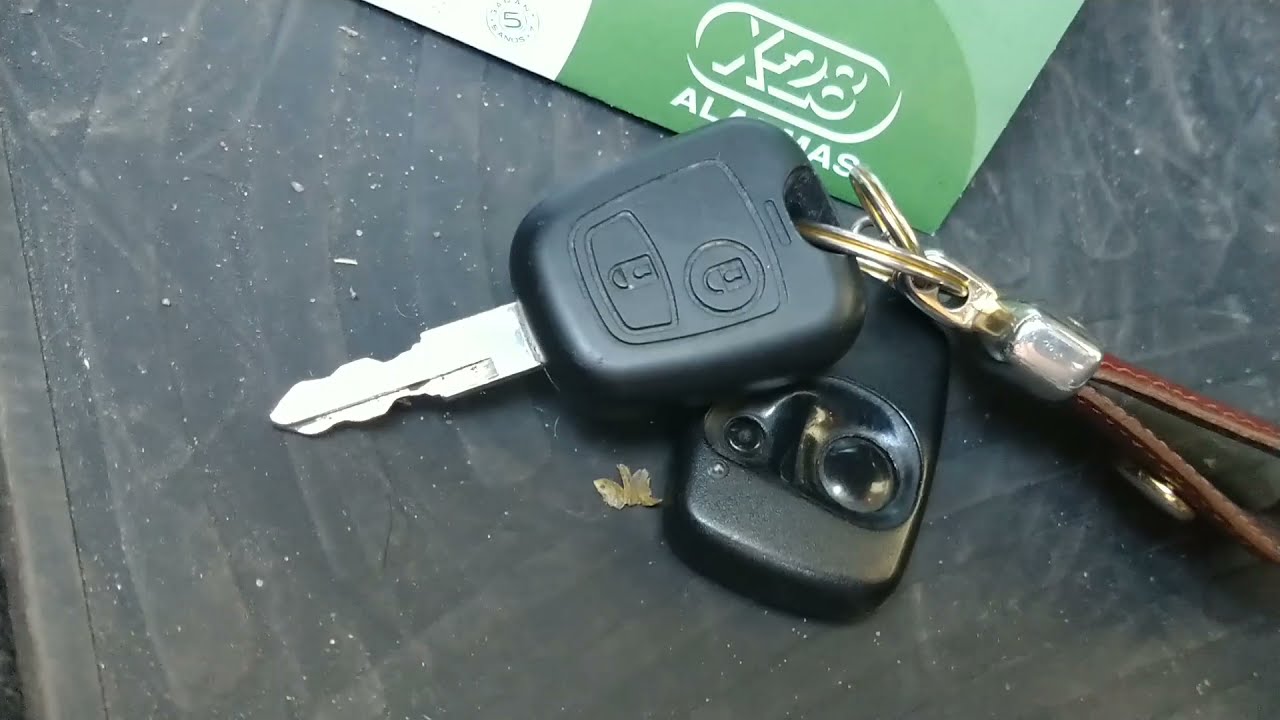 Cómo instalar alarma Keylees, para comando original en Peugeot 207