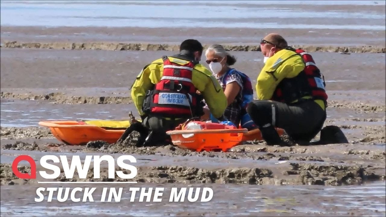 UK woman had to be rescued from a beach this weekend after she was swallowed up by the mud | SWNS