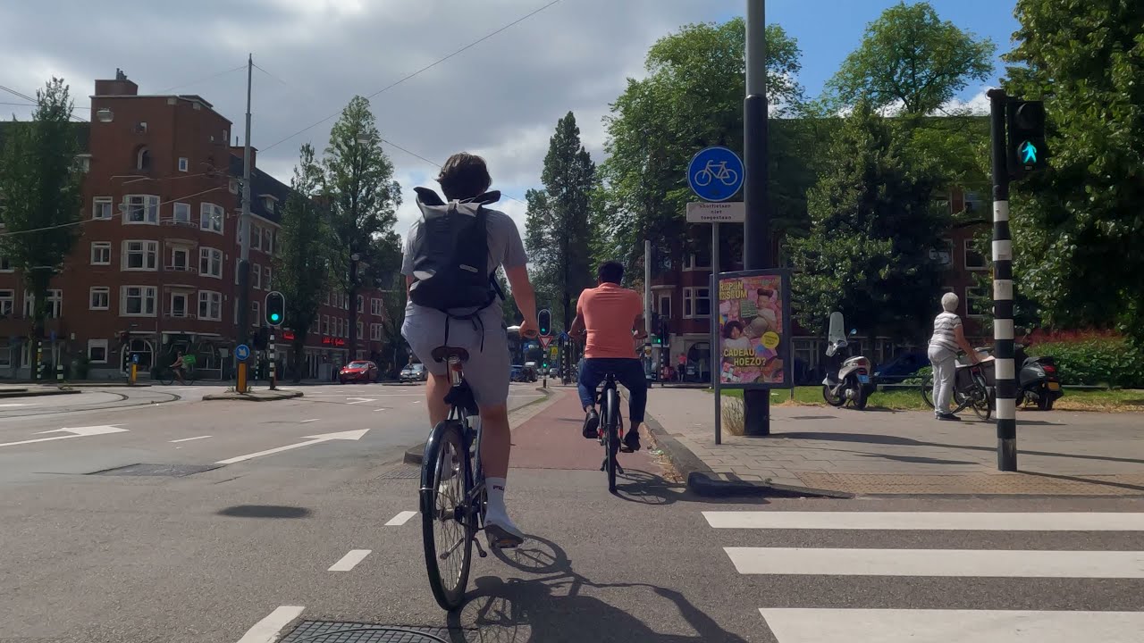 Streets of Amsterdam. Through the long shopping streets in Amsterdam South / De Pijp. 22 july 2021.