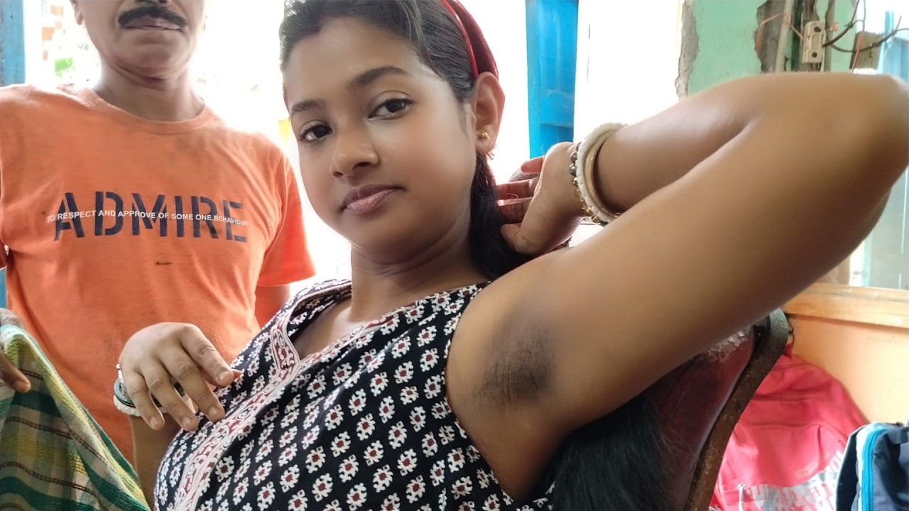 Indian mother shaved in front of her kid at a road side barbershop💈