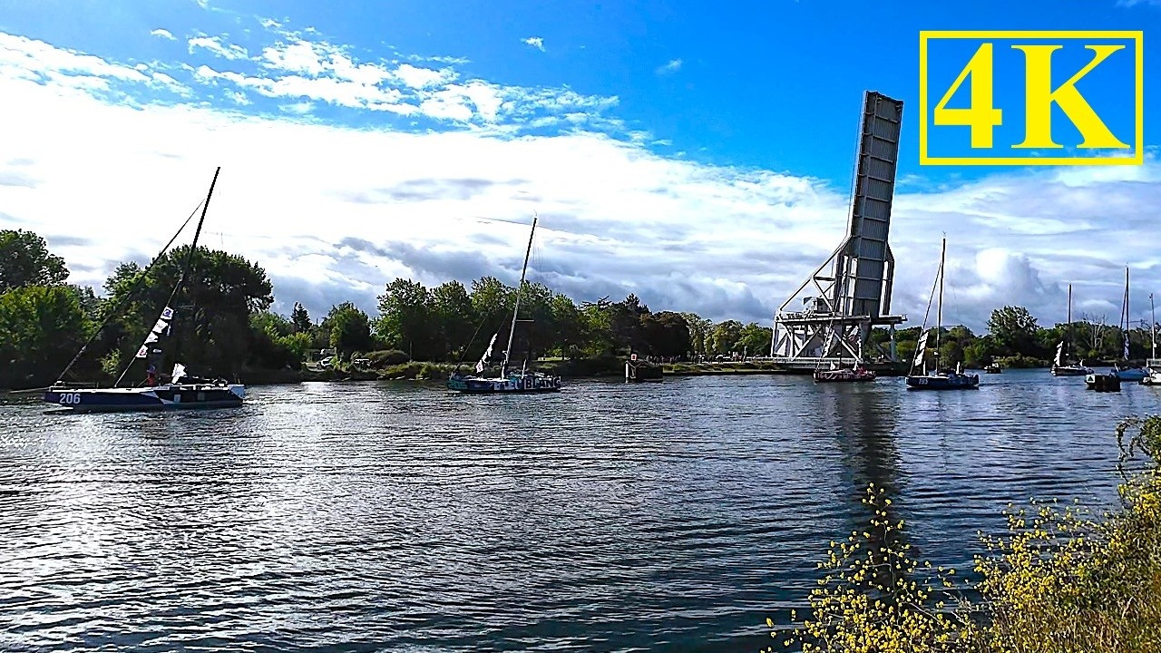 Procession of sailboats / Normandy Channel Race / Caen Canal / France