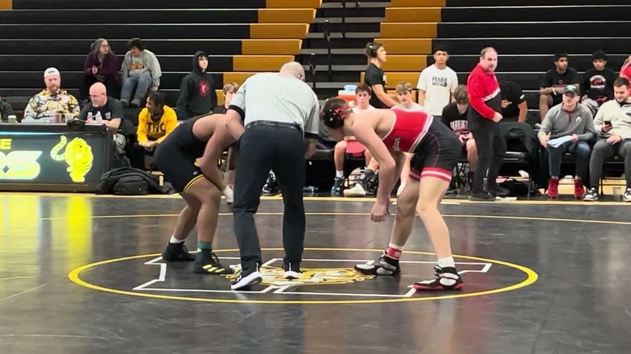Wrestling match Joilet West high school 175 pounds