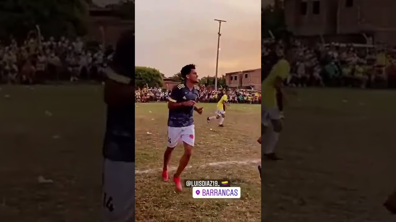 Luis Diaz playing football with the people of his hometown.