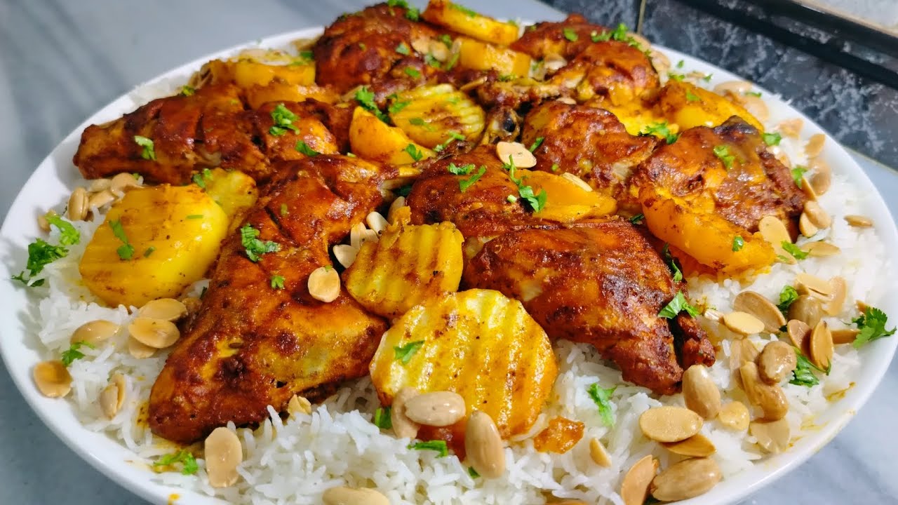 افخاذ الدجاج التندوري مع البطاطا والارز المبهر وصفة عالمية💯💯💯. #وصفات أرز و دجاج 