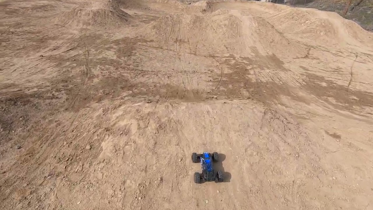 Fully Upgraded Traxxas 1/16 Mini Revo at the Dirt Jumps Bashing