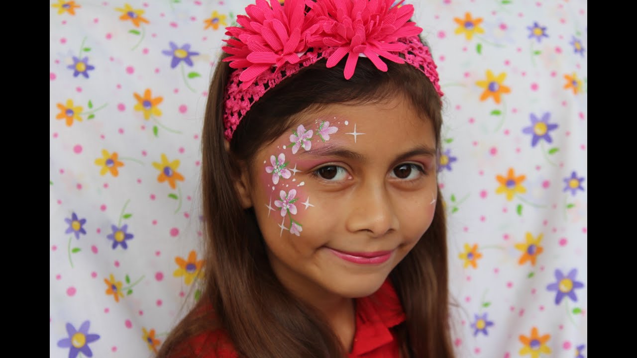 DISEÑO FACIL Y RAPIDO DE FLORES EN MEDIA CARA  PINTACARITAS.- FAST FLOWER DESING ( FACE PAINTING )