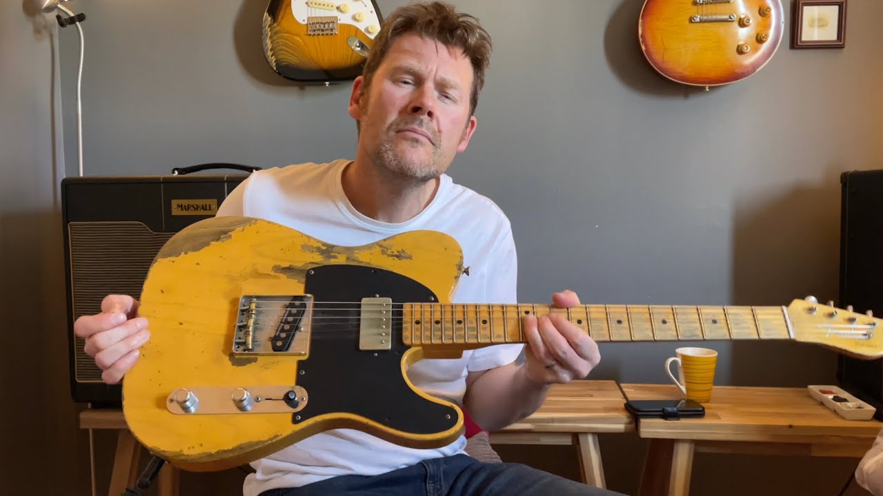 Урок игры на гитаре: разберём композицию «Brush with the Blues»