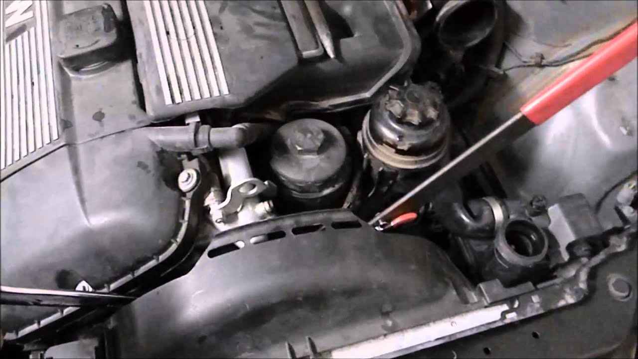 HOW TO REPLACE WATER PUMP ON BMW325i//REPLACING WATER PUMP ON BMW 325i PART 2