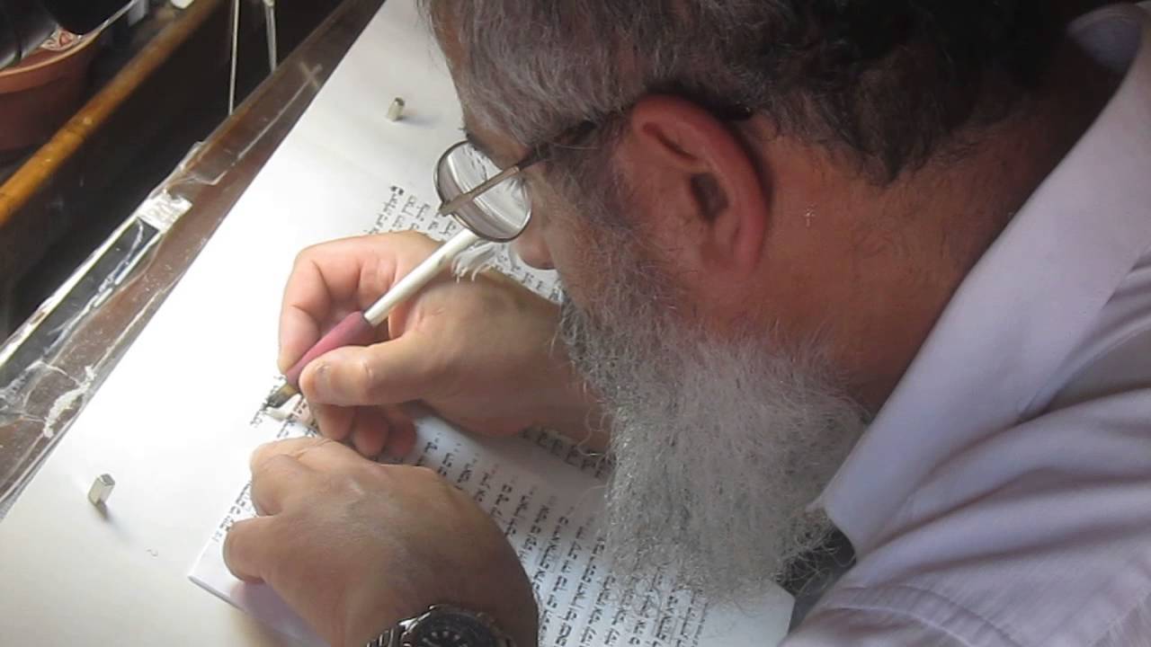 A scribe begins to write a new Torah scroll (Genesis). The ancient synagogue at Masada, Israel