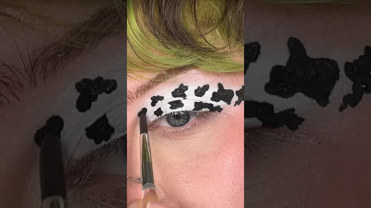 makeup inspired by my earrings! earrings from Kikay! 🐄✨ #graphicliner #cowprint #creativemakeup