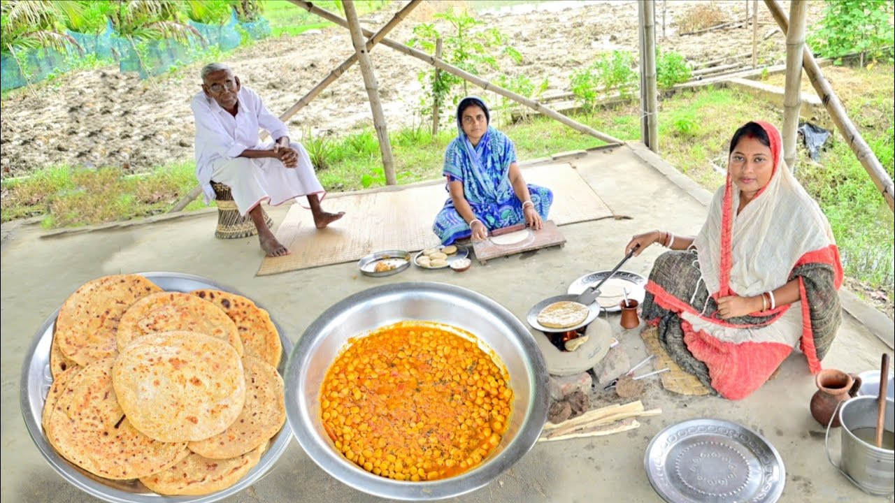 মাটির চুলায় পুর ভরা আলুর পরোটা আর চানা মশলা রান্না করলাম সাথে জমজমাট খাওয়া দাওয়া