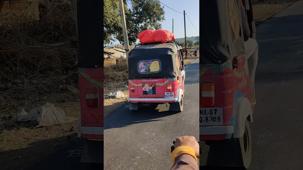 Foreigners using Auto Rickshaw as a tourist vehicle in India