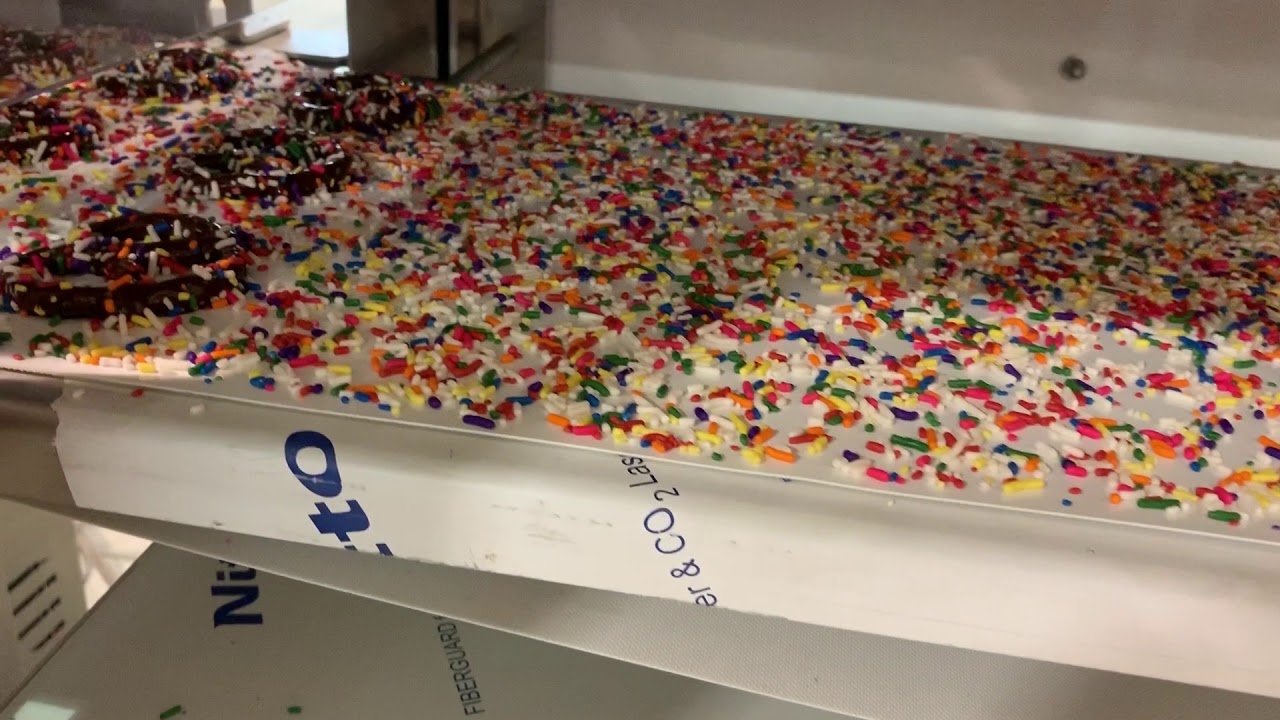 Sprinkle decorator on enrobing line 12''