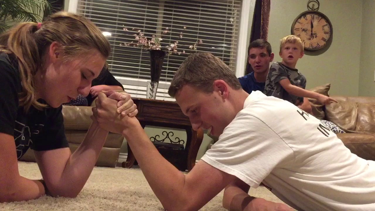 Maddy arm wrestling Chris