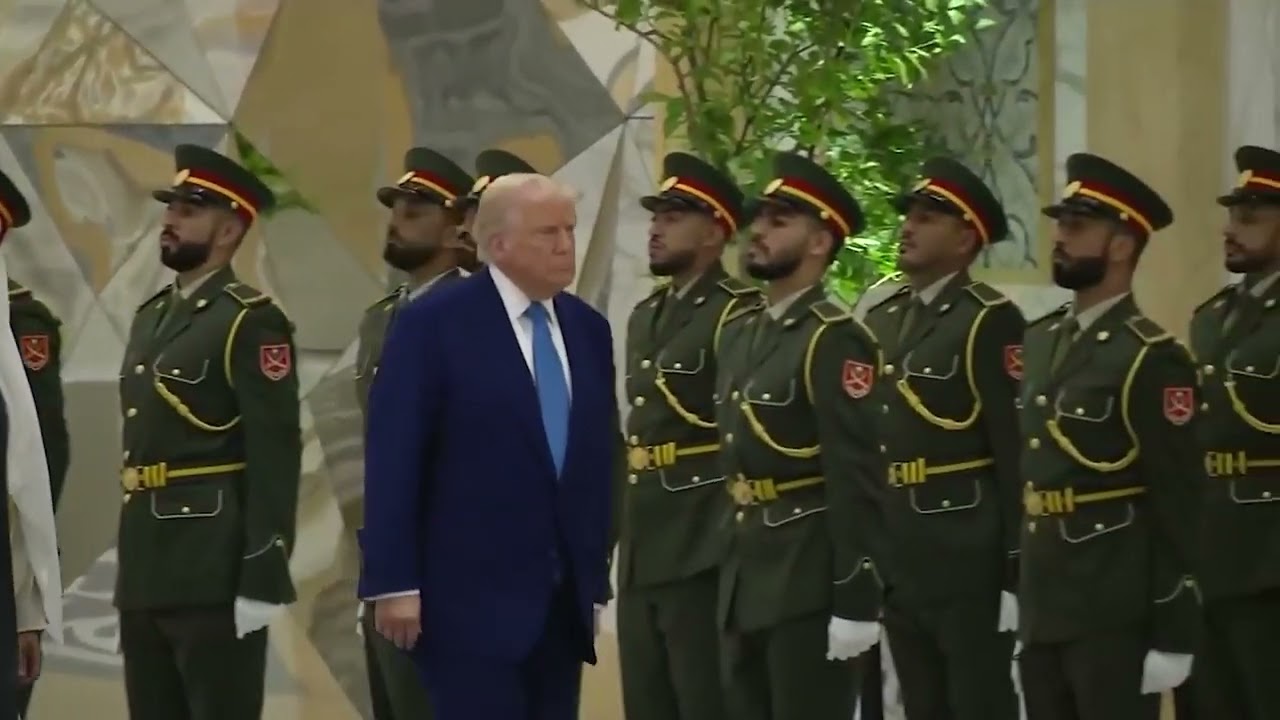 Trump greeted by children waving U.S. and U.A.E. flags