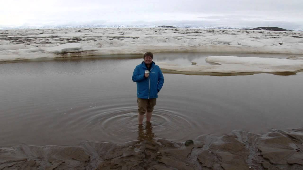 Nathan Coleman takes a dip in Frobisher Bay, Nunavut