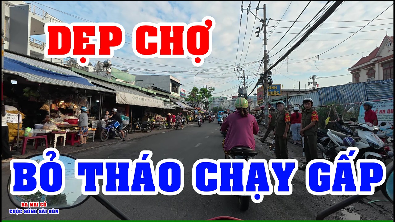 VIỆT KIỀU BẤT NGỜ THẤY CẢNH TƯỢNG DẸP CHỢ DÂN ÔM DÙ CHẠY GẤP