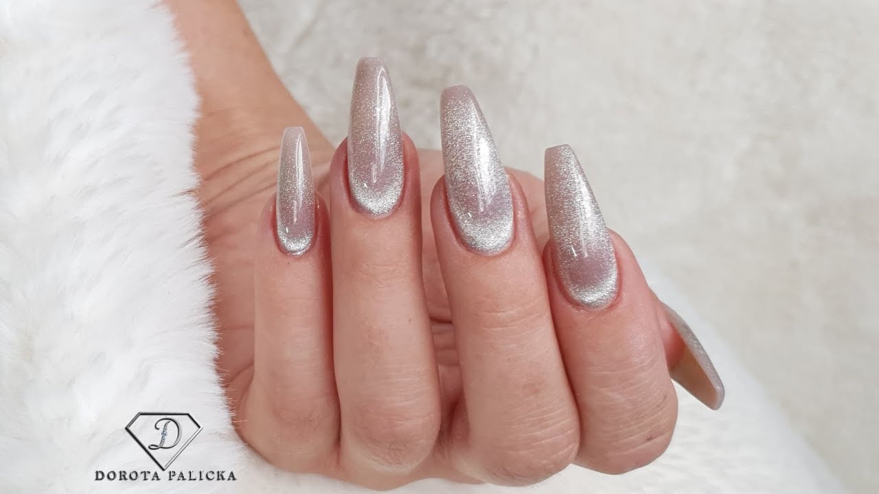 Tiger eye. Doing cuticle work on my nails with E-file  and new cat eye nail art. Snowlight Cat Eye
