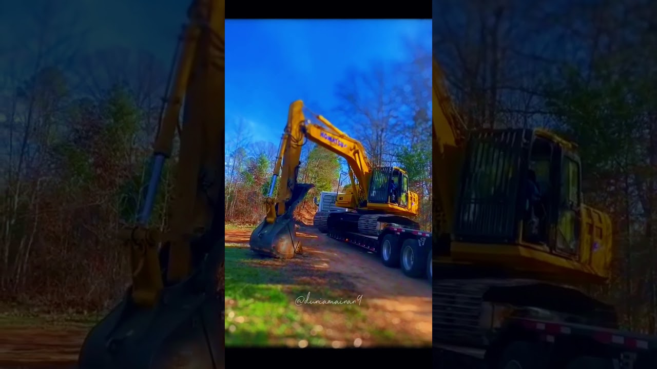Miniature Heavy Move: Excavator Unloading from Transport Truck 