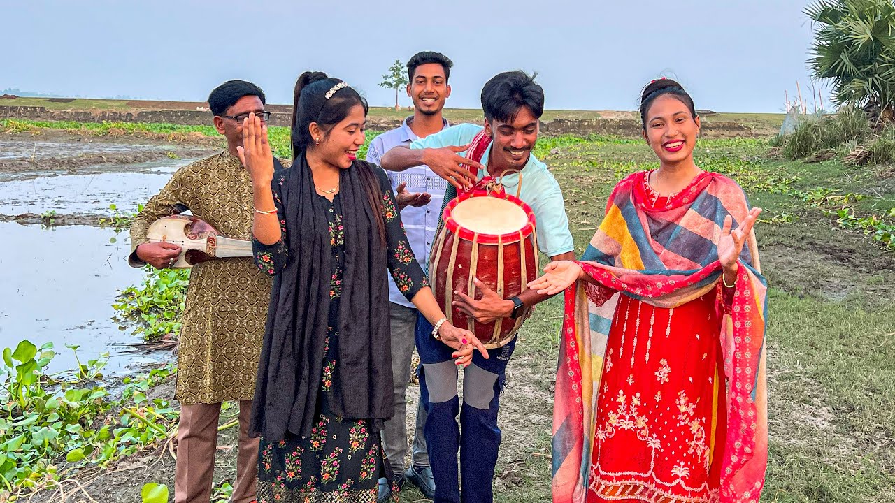 দোতারার সুরে বাঁধা গানের আড্ডা, যেখানে সুরে মেলে আনন্দের ছোঁয়া। 🎶❤️
