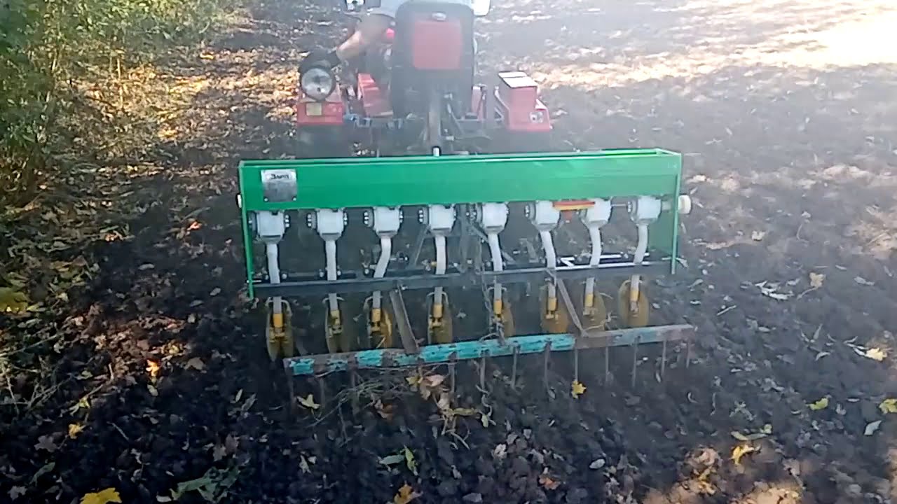Мототрактор в роботі з сівалкою заря (Вдосконалення)