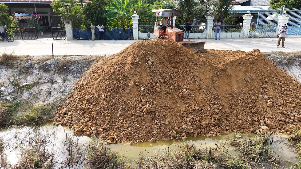 Amazing Landfilling Up Project, Good Skill Bulldozer Push Soil In Low Land With Dump Trucks Working