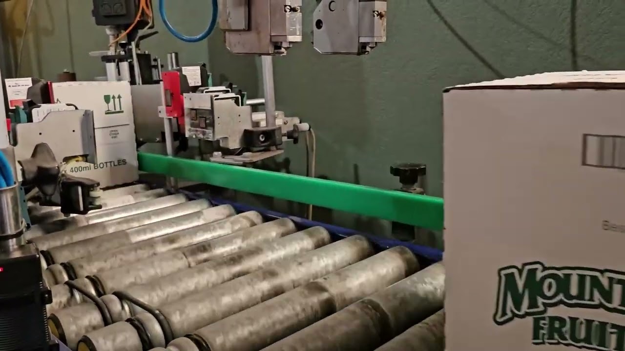 SNEED-JET&reg; Freedom 22 Thermal Inkjet Case Coder Printing Best By Dates on Both Sides of Case 1