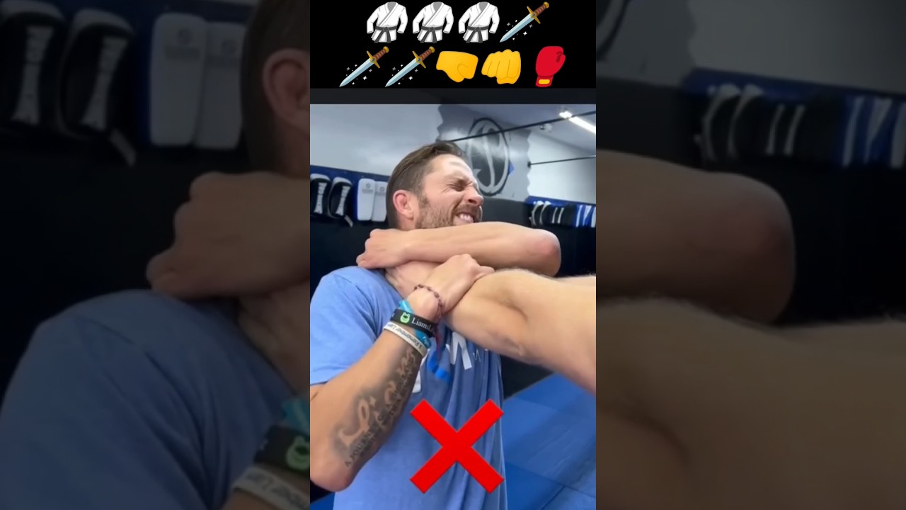 double hand collar grab self defence technique. 