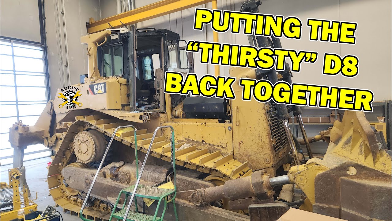 «Жаждущий» бульдозер Cat D8 собирается обратно. Установка головки 3406.