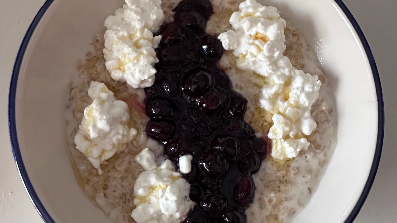 Breakfast oatmeal with cottage cheese and blueberries
