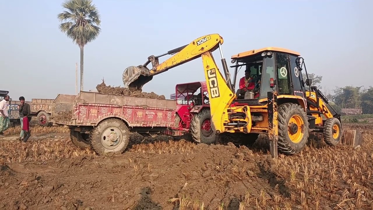 JCB machine on loding tractor Mahindra swaraj Sonalika and power track video....