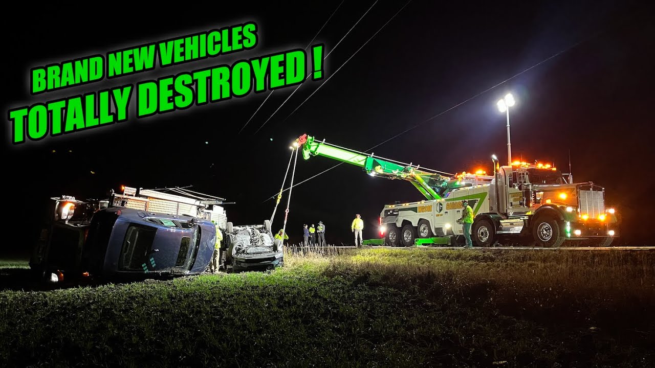 Car Hauler rolls over and DESTROYS a load of BRAND NEW vehicles