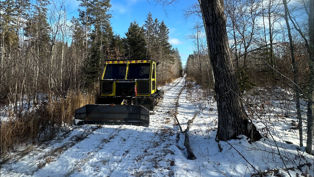 Packing in some swamp roads! Big Block Snow Cat Action.