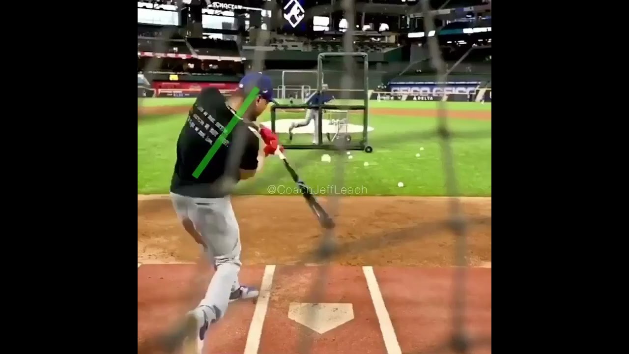 Mookie hinges at the hip, leaning forward toward the plate at heel strike.