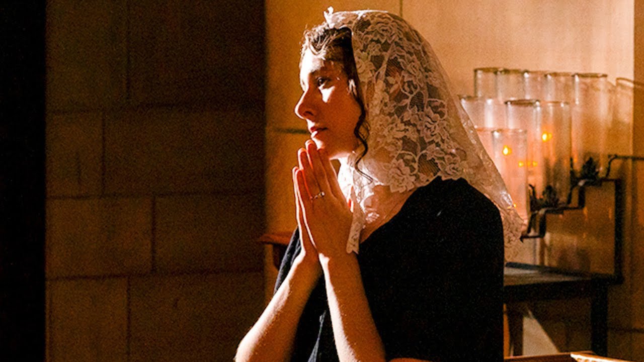 The Young Catholic Women Wearing The Veil