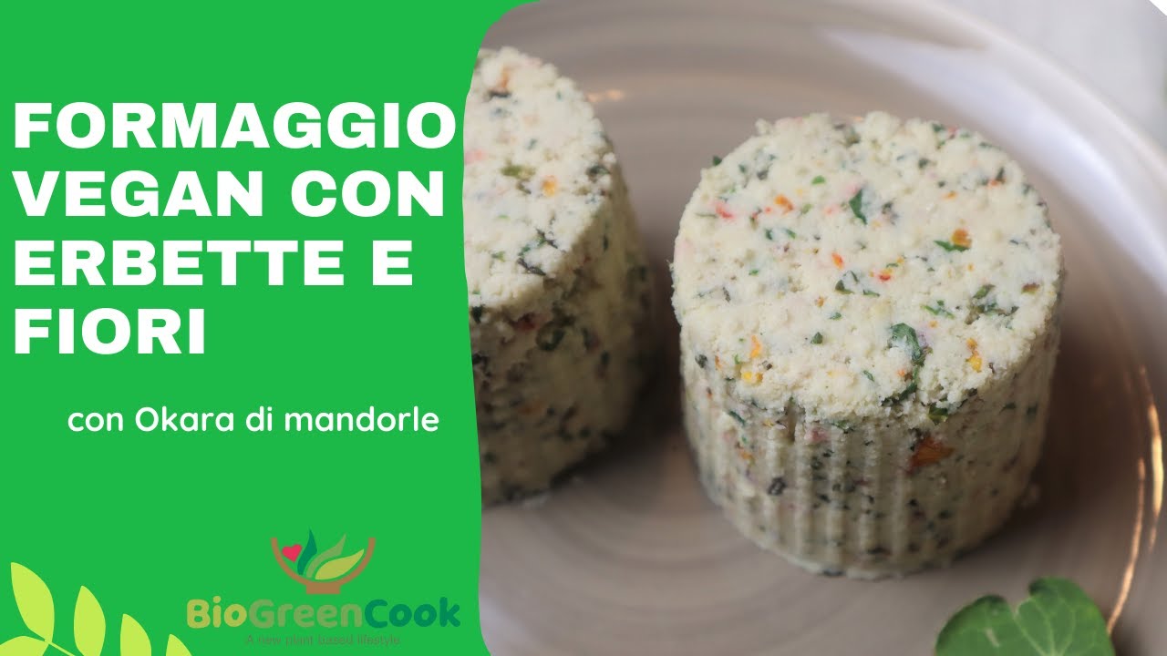 Formaggio vegan con erbe aromatiche e fiori eduli elaborato con okara di mandorle.