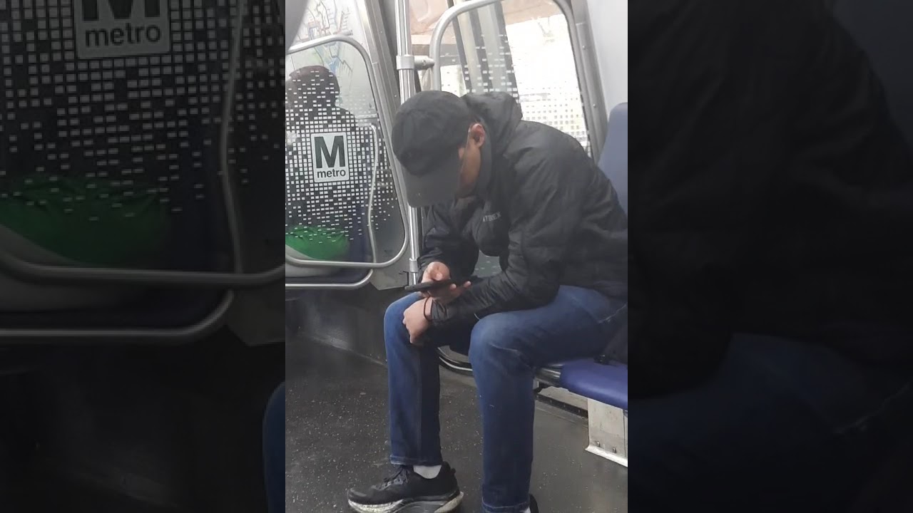 weirdo racist Indian man playing disturbing games on DC metro profiling disabled man