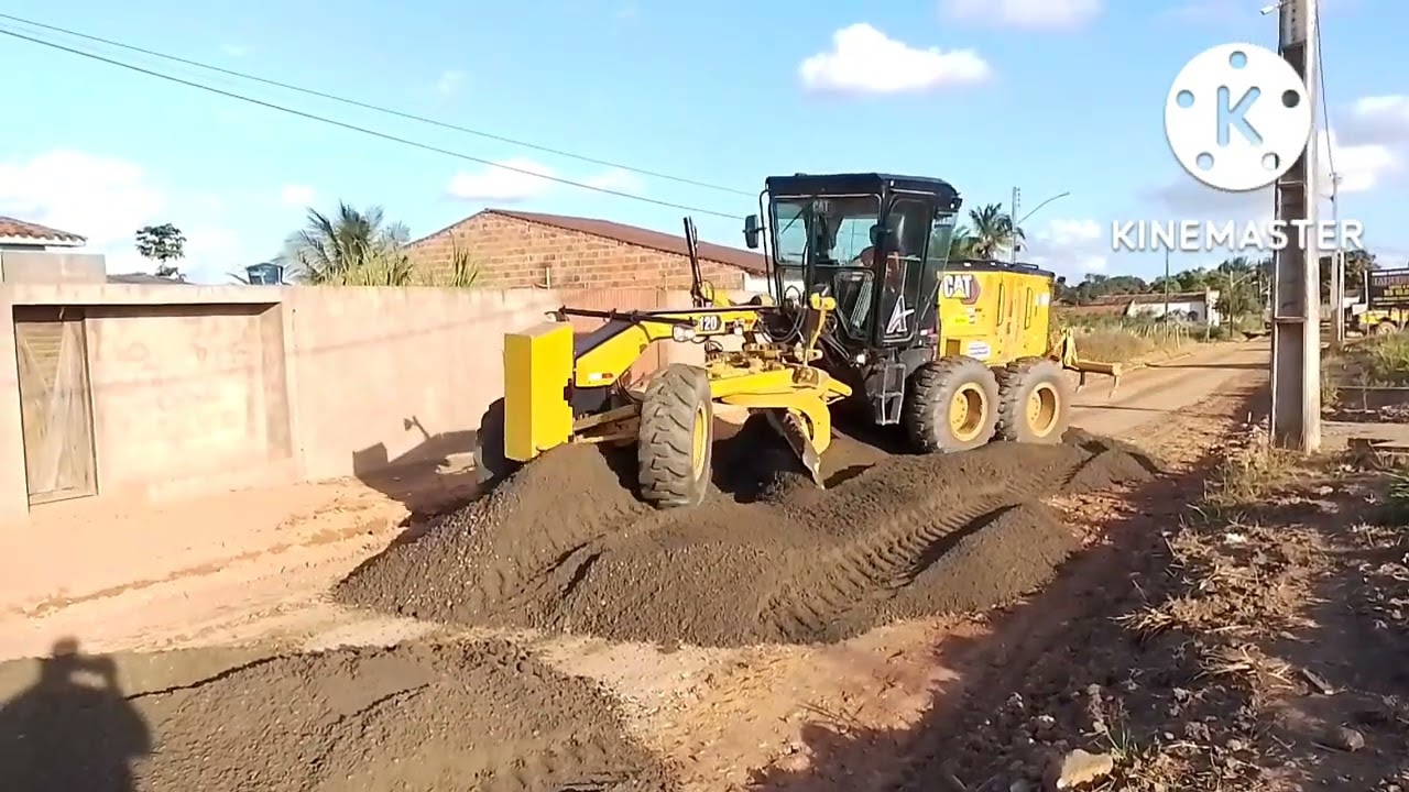 motoniveladora cat 120 - espalhando material