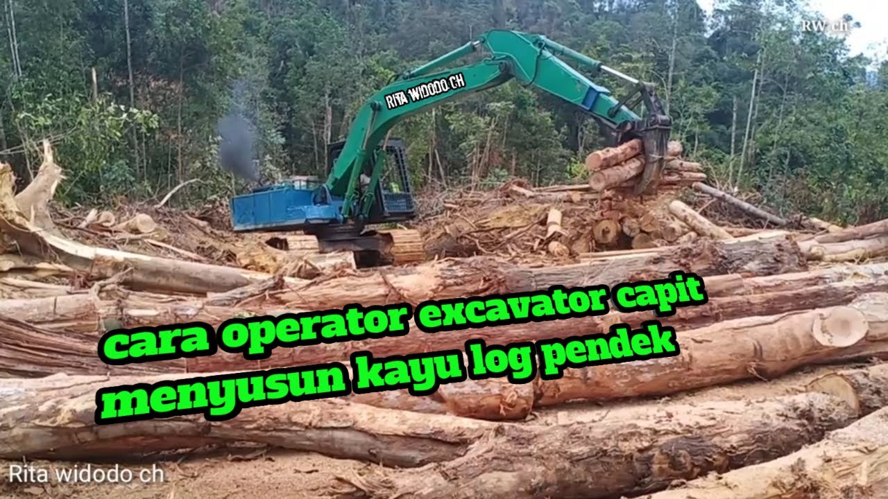 Bagaimana cara operator excavator capit susun kayu log pendek